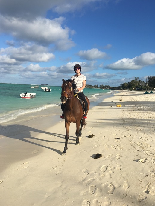 Horse riding along the beach 2