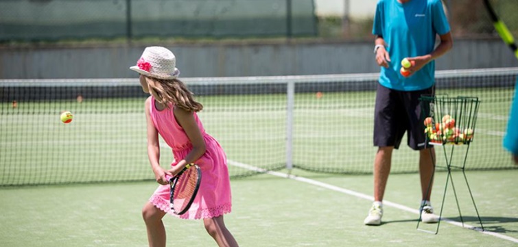 Kids playing tennis